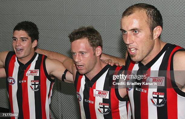 Saints players celebrate victory after the round 22 AFL match between the Brisbane Lions and the St.Kilda Saints at the Gabba on September 2, 2006 in...