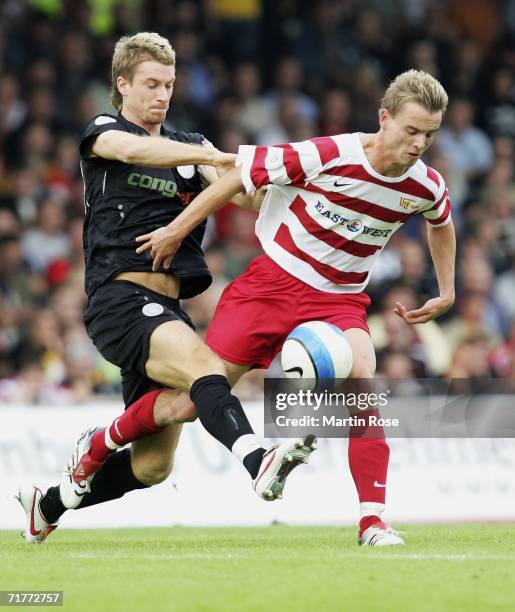 Marvin Braun of St.Pauli and Daniel Schulz of Berlin fight for the ball during the Third League match between FC St.Pauli and Union Berlin at the...