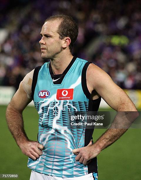 Matthew Bishop of the Power looks on after losing the round 22 AFL match between the Fremantle Dockers and the Port Adelaide Power at Subiaco Oval...