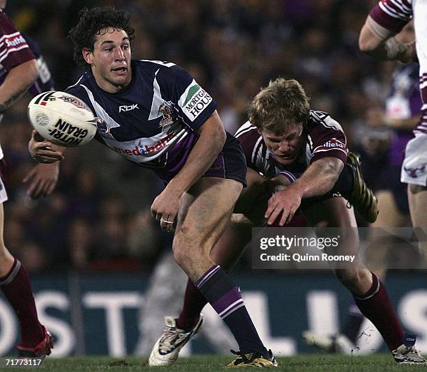 Billy Slater of the Storm passes the ball during the round 26 NRL match between the Melbourne Storm and the Manly Warringah Sea Eagles at Olympic...