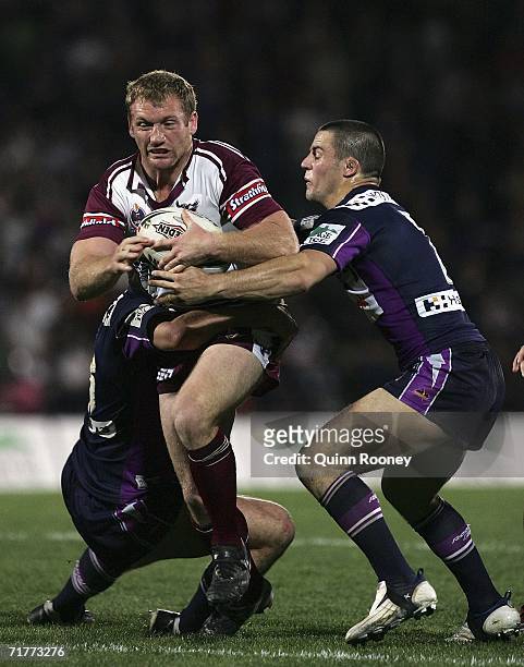 Michael Monaghan of the Sea Eagles breaks through a tackle during the round 26 NRL match between the Melbourne Storm and the Manly Warringah Sea...