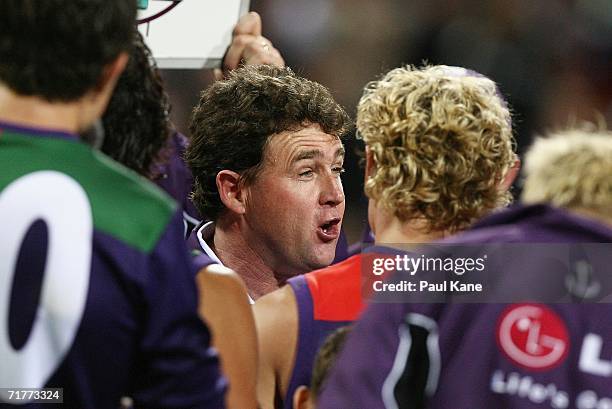 Chris Connolly, coach of the Dockers, addresses his players during the round 22 AFL match between the Fremantle Dockers and the Port Adelaide Power...