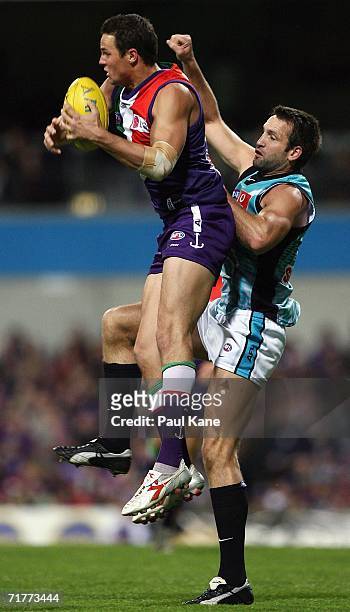 Graham Polak of the Dockers marks the ball during the round 22 AFL match between the Fremantle Dockers and the Port Adelaide Power at Subiaco Oval on...