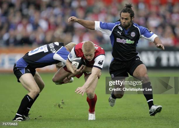 Iain Balshaw of Gloucester is tackled by Michael Stephenson of Bath during the Guinness Premiership match between Gloucester and Bath at Kingsholm...