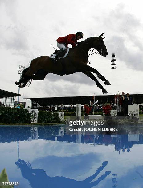 Meredith Michaels-Beerbaum of Germany on "Shutterfly" compets in the Jumping Individual Classification of the World Equestrian Games in Aachen 02...
