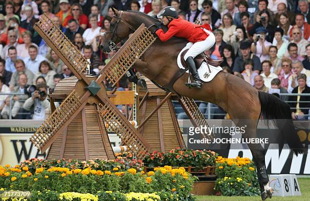 German rider Meredith Michaels-Beerbaum on "Shutterfly" competes in the Jumping Individual Classification of the World Equestrian Games in Aachen 02...