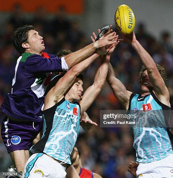 Justin Longmuir of the Dockers contests a mark during the round 22 AFL match between the Fremantle Dockers and the Port Adelaide Power at Subiaco...