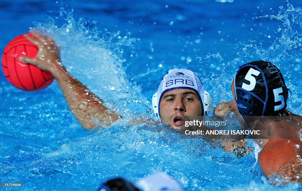 Serbia's Aleksandar Sapic (L) is challen