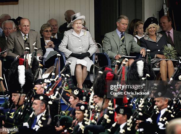 Prince Philip, Duke of Edinburgh, Queen Elizabeth II, Prince Charles, The Prince of Wales and Camilla, Duchess of Cornwall watch pipers march past...
