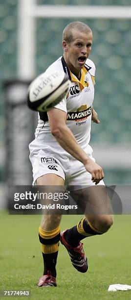 Dave Walder of Wasps passes the ball during the Guinness Premiership match between Saracens and London Wasps at Twickenham on September 2, 2006 in...