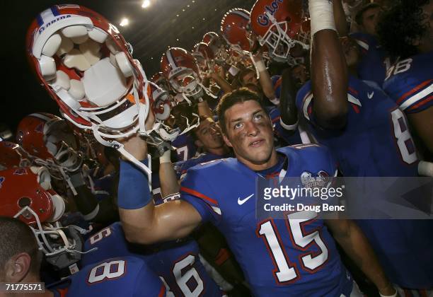 Quarterback Tim Tebow of the University of Florida Gators celebrates after defeating the Southern Miss Golden Eagles at Ben Hill Griffin Stadium on...