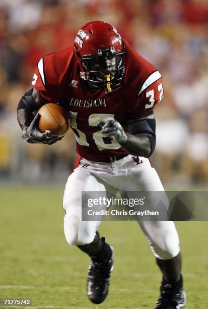 Tyrell Fenroy of the University of Louisiana Lafayette runs against Louisiana State University on September 2, 2006 at Tiger Stadium in Baton Rouge,...