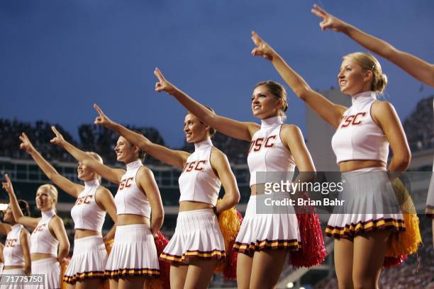 Cheerleaders from the University of Southern California Trojans encourage their fans before a game against the University of Arkansas Razorbacks on...