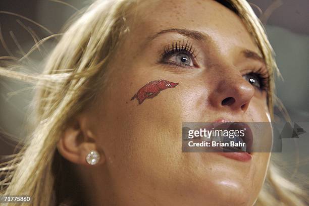 An Arkansas Razorbacks' cheerleader watches a game against the University of Southern California Trojans on September 2, 2006 at Donald W. Reynolds...