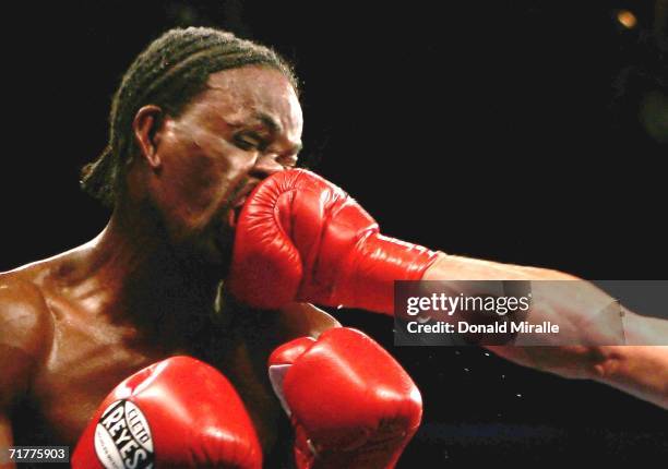 Eric Aiken gets hit in the face by Robert Guerrero during their IBF featherweight championship fight at Staples Center on September 2, 2006 in Los...