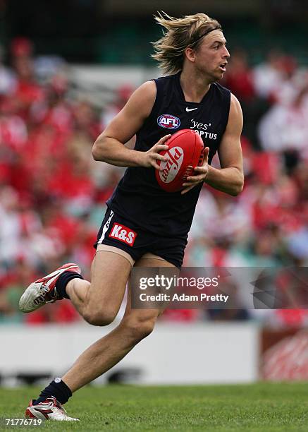 Matthew Lappin of Blues runs the ball during the round 22 AFL match between the Sydney Swans and the Carlton Blues at the Sydney Cricket Ground on...