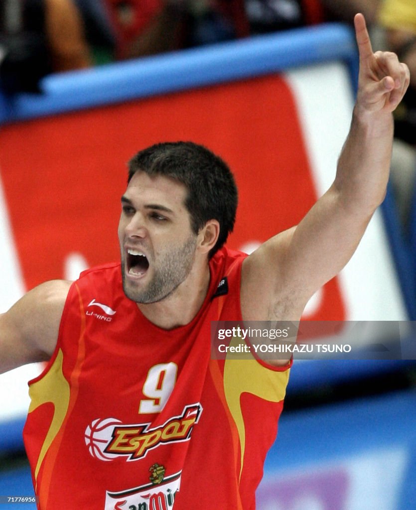 Spain's Felipe Reyes reacts after scorin