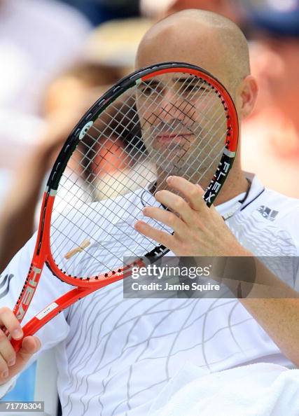 Audrey Agassi Racket Andre Agassi adjusts his racquet between games against Benjamin... News ...