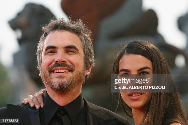 Mexican director Alfonso Cuaron, next to his wife Annalisa arrives for the screening of his movie "Children of Men" at the Lido of Venice, 03...