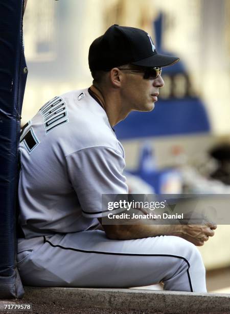 Manager Joe Girardi of the Florida Marlins watches as his team takes on the Milwaukee Brewers September 3, 2006 at Miller Park in Milwaukee,...