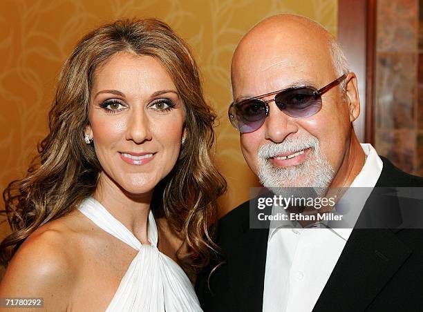 Singer Celine Dion and her husband and manager Rene Angelil pose after Dion performed at the 41st annual Labor Day Telethon to benefit the Muscular...
