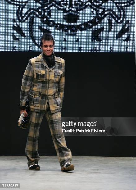 New Generation designer Bernard Taylor of Xenheist waves to the audience following his collection show during Rosemount Australian Fashion Week...