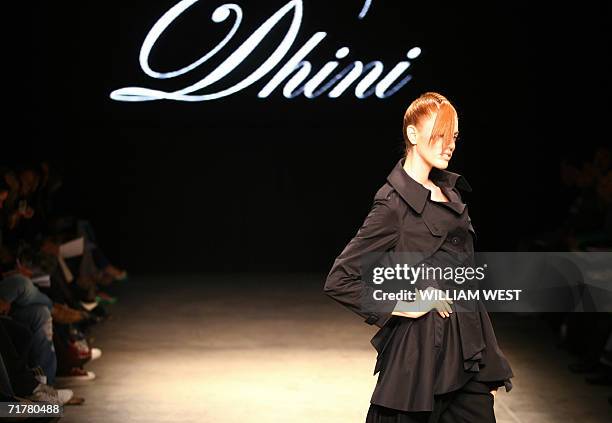 Model parades an outfit by Australian label Dhini during a New Generation show at Australian Fashion Week, in Melbourne 04 September 2006. Designers...