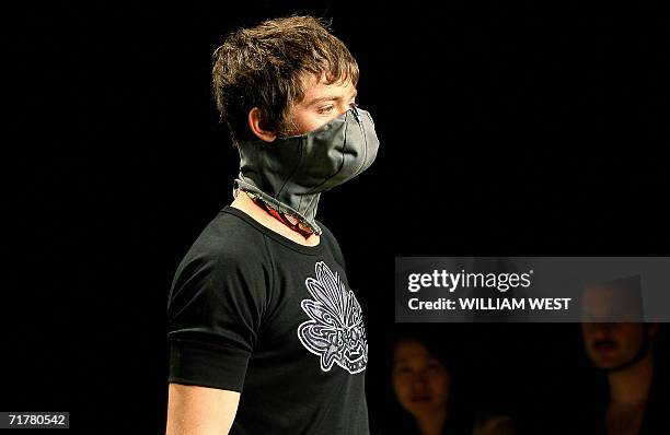 Model parades an outfit by Australian label Xenheist during a New Generation show at Australian Fashion Week, in Melbourne 04 September 2006....