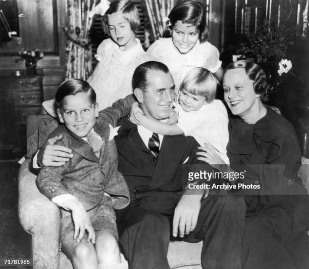 American businessman, politician and Olympic rowing champion John B. Kelly, Sr. With his wife Margaret and their children, circa 1935. Standing, left...