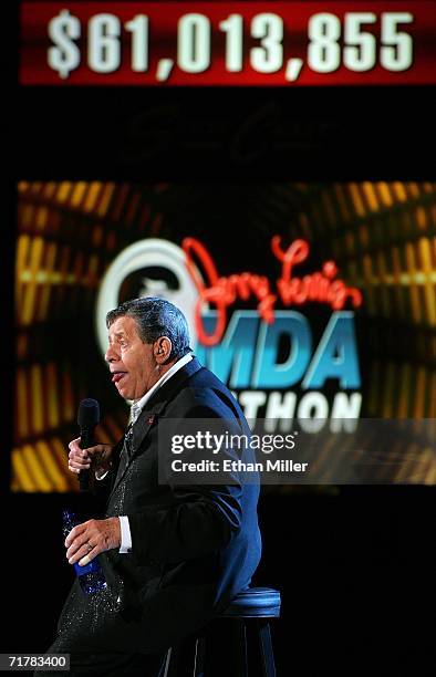 Entertainer Jerry Lewis jokes by spilling his bottle of water at the end of the 41st annual Labor Day Telethon to benefit the Muscular Dystrophy...