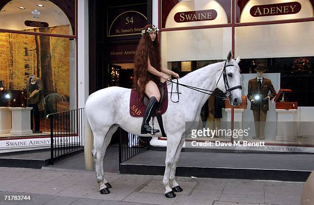 The Lady Godiva, Laurella Fox-Pitt, arrives on a horse to the Swaine Adeney Brigg store for the 'Best In Show' Launch Party, at Swaine Adeney Brigg...