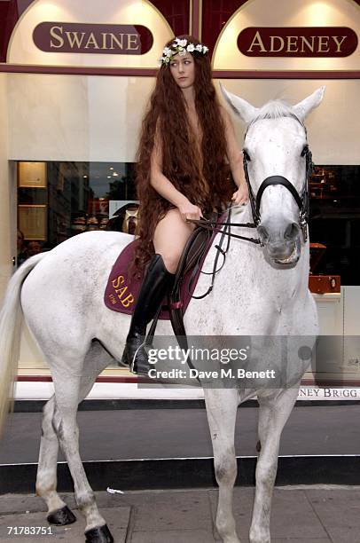 The Lady Godiva, Laurella Fox-Pitt, arrives on a horse to the Swaine Adeney Brigg store for the 'Best In Show' Launch Party, at Swaine Adeney Brigg...