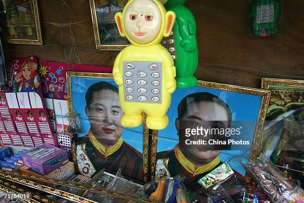 Portraits of the Panchen Lama are sold at a store on August 29, 2006 in Nyingchi County of Tibet Autonomous Region, China. Chinese tourists are...