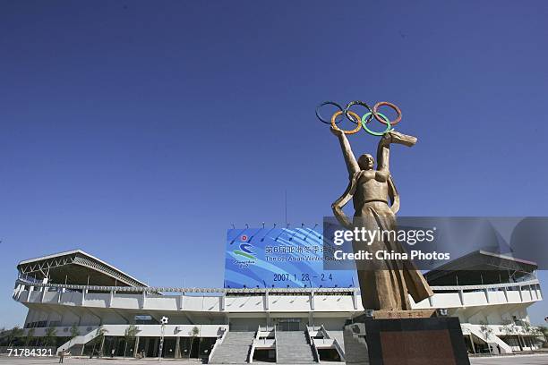 Sculpture stands outside the Changchun Wuhuan Stadium, where the opening ceremony of the 6th Asian Winter Games will be held, September 4, 2006 in...
