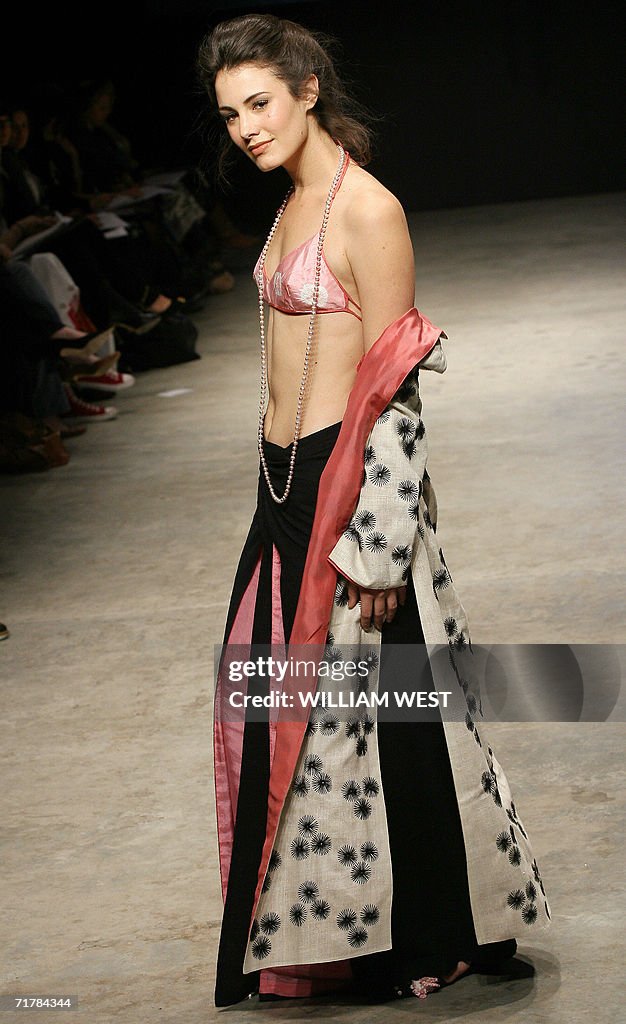 A model parades an outfit by Indian labe