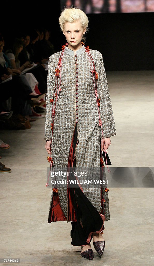 A model parades an outfit by Indian labe