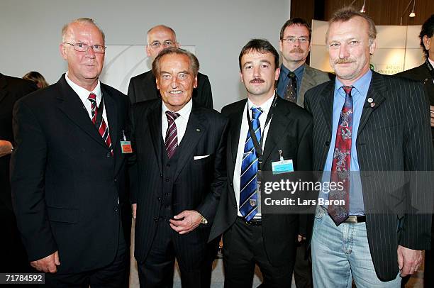 President Gerhard Mayer-Vorfelder poses with members of the Club 100 during the German Football Federation 'Club 100' Awards to honour the regional...