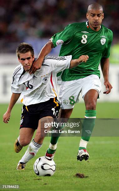 Philipp Lahm of Germany in action with Steven Reid of Ireland during the UEFA EURO 2008 qualifying match between Germany and the Republic of Ireland...