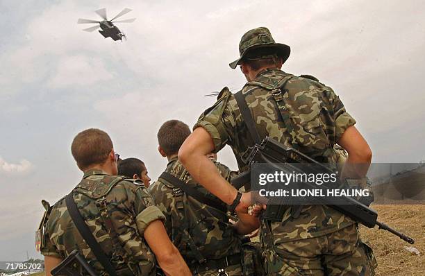 Kinshasa, Democratic Republic of the Congo: Spanish EUFOR troops from Almeria, stand near a helicopter pad, 05 September 2006, at N'Dolo Airbase, in...