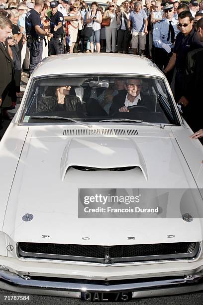 Director Claude Lelouch arrives driving a Mustang with actress Anouk Aimee at the 32nd Deauville Festival Of American Film as the city of Deauville...
