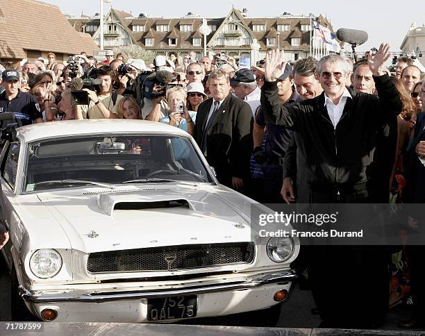 Director Claude Lelouch arrives driving a Mustang at the 32nd Deauville Festival Of American Film as the city of Deauville pays homage to Lelouch on...