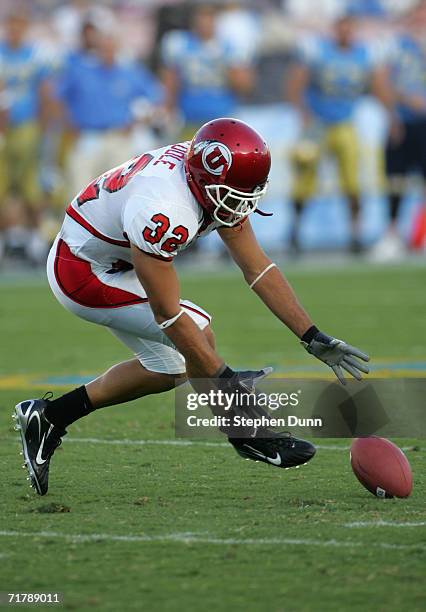 Eric Weddle of the Utah Utes dives for a loose ball against the UCLA Bruins during the college football game held on Septemeber 2, 2006 at the Rose...