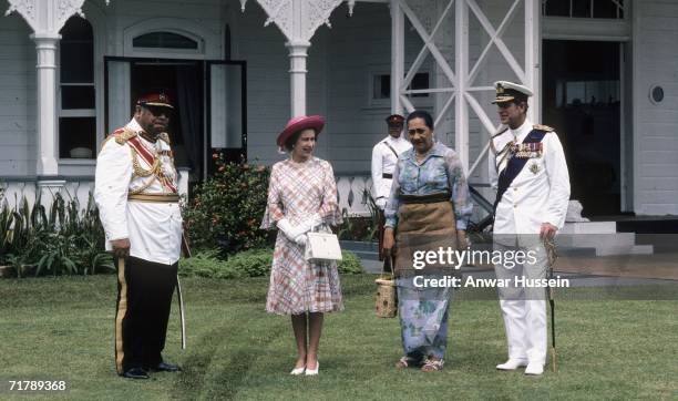 King Taufa'ahau Tupou lV of Tonga and his wife meet Queen Elizabeth ll and Prince Philip, Duke of Edinburgh, during their visit to Tonga in February...