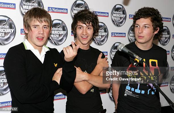 Nationwide Mercury Prize winners Arctic Monkeys Jamie Cook, Alex Turner and Matt Helders pose backstage at the annual Nationwide Mercury Prize music...