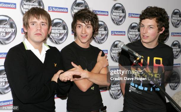 Nationwide Mercury Prize winners Arctic Monkeys Jamie Cook, Alex Turner and Matt Helders pose backstage at the annual Nationwide Mercury Prize music...