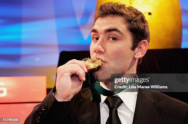 Cameron Smith of the Melbourne Storm kisses the Dally M Award medal after the presentation at the Dally M Awards at Sydney Town Hall September 5,...