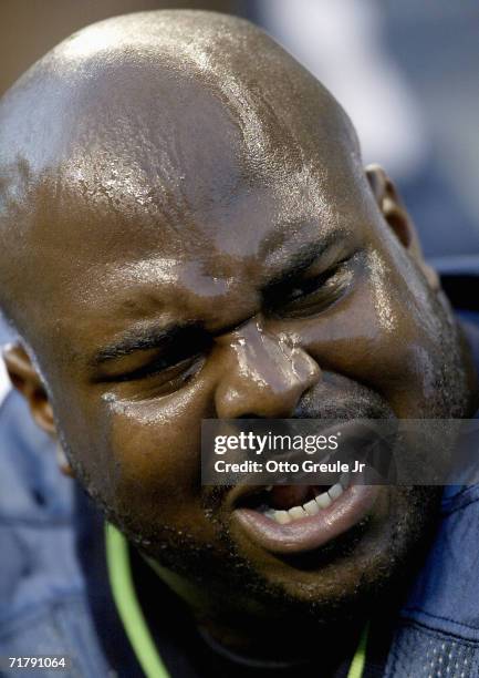 Floyd Womack of the Seattle Seahawks rests on the sideline during the game with the Oakland Raiders on August 31, 2006 at Qwest Field in Seattle...