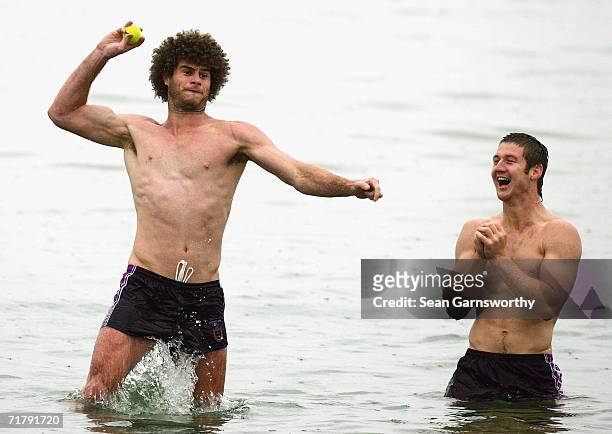 Matt King of the Storm throws a tennis ball during a Melbourne Storm recovery session at St Kilda Beach on September 6, 2006 in Melbourne, Australia....