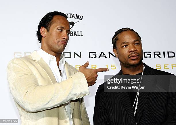 Actor Dwayne "The Rock" Johnson and singer/actor Alvin "Xzibit" Joiner arrive at the premiere of Columbia Picture's "Gridiron Gang" at the Chinese...