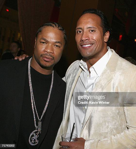 Actor/singer Alvin "Xzibit" Joiner and actor Dwayne "The Rock" Johnson pose at the afterparty for the premiere of Columbia's "Gridiron Gang" at The...